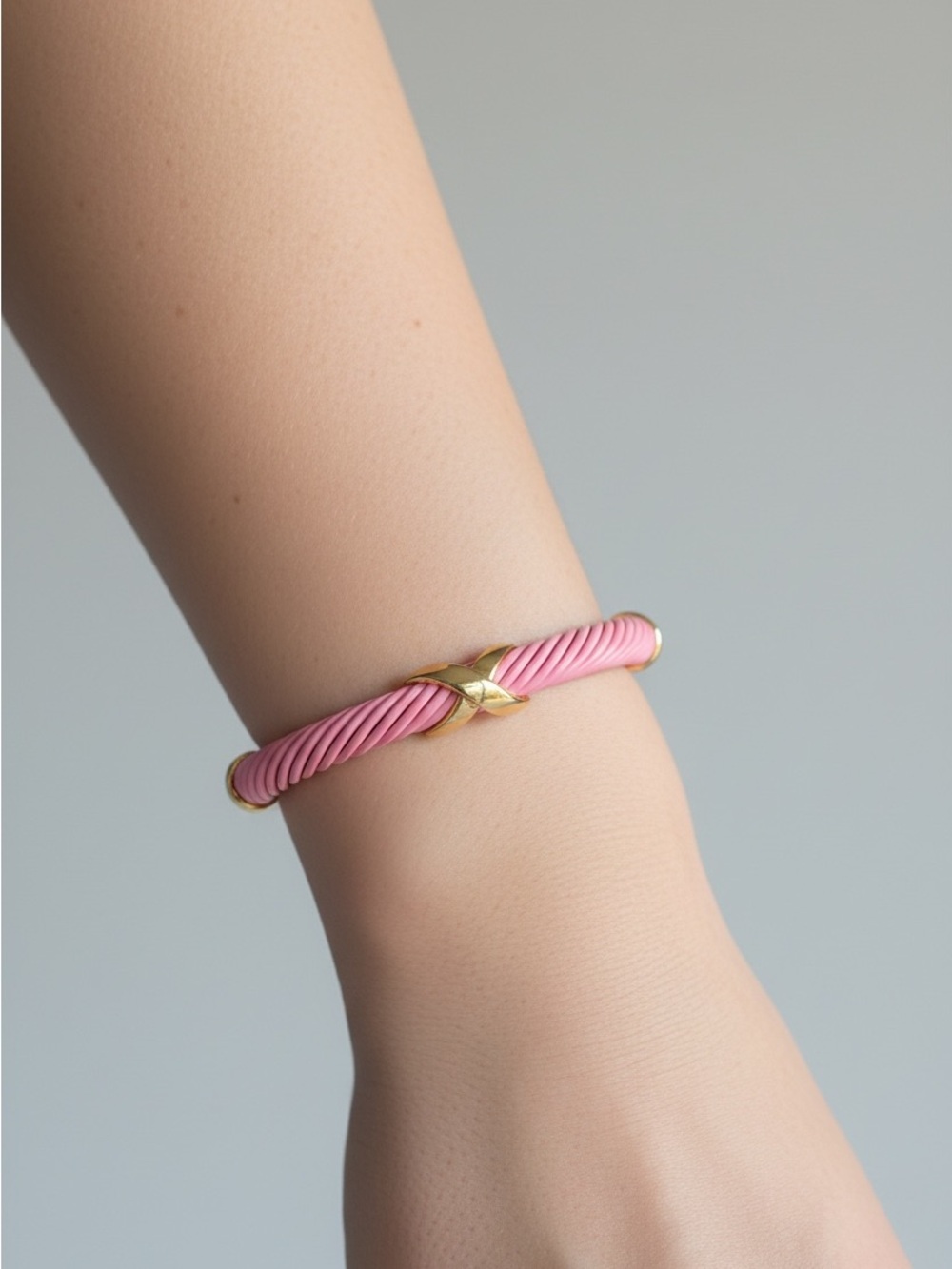 10/14 Pink Twisted Cable Bracelet with Gold Accent